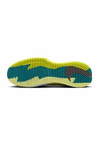 Sneaker-Sohle in leuchtendem Gelb und Türkis, mit einem strukturierten Gripp-Muster und einem gebogenen braunen Akzent. Glatte Oberfläche mit klaren Farbsegmenten.