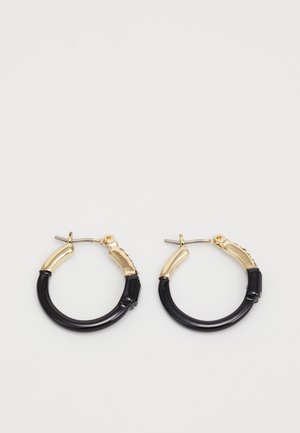 Hoop earrings with gold and black segmented design, featuring a smooth curved lower half and a textured upper half.