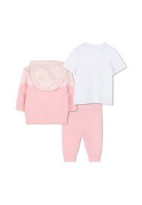 Three-piece children’s outfit: pink color block hoodie with hood, white short-sleeve shirt, and pink sweatpants with elastic cuffs.