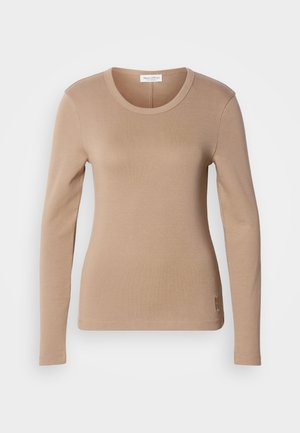 Blusa de manga longa em bege claro, com decote redondo e corte justo. Feita de um tecido macio e elástico, com uma textura subtil. Pequeno detalhe de logotipo na barra.