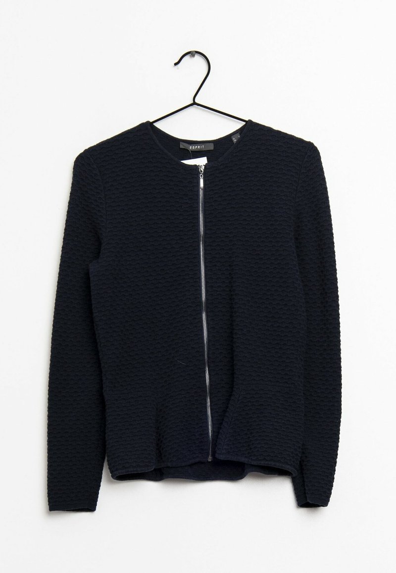 Navy blue textured jacket with long sleeves and a round neckline. Features a front zipper closure and hanging hook for display.