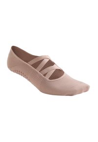 Vaaleanpunainen näkymätön sukka joustavasta kankaasta, jossa on ristikkäiset kuminauhat, resorikuvio ja kumipinnoite pohjassa.