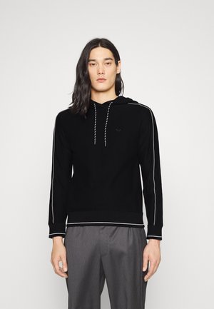 Welche Kriterien es vor dem Kaufen die Pullover armani zu untersuchen gibt!