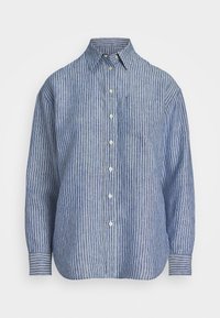 Sininen ja valkoinen raidallinen napillinen paita, valmistettu kevyestä kankaasta, jossa on tasku vasemmassa rinnassa ja pitkät hihat, joissa on napilliset hihansuut.