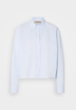 Light blue button-up shirt with a collared neckline, long sleeves, and vertical stitching accents down the front. Smooth fabric texture.