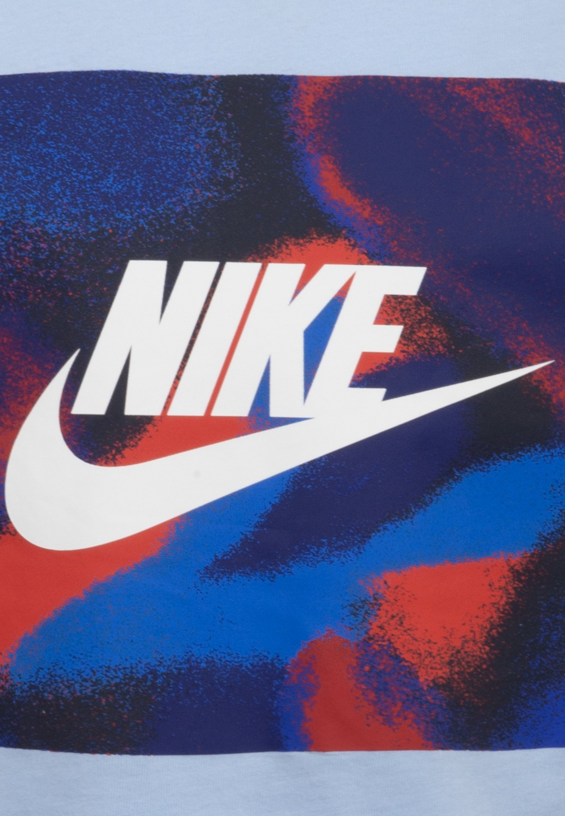 blue and red nike shirt
