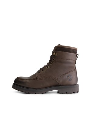 Bruine leren enkellaars met veters, ronde neus en textuur van suède accenten. Voorzien van metalen oogjes en een robuuste rubberen zool.