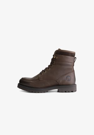 Bruine leren enkellaars met veters, ronde neus en textuur van suède accenten. Voorzien van metalen oogjes en een robuuste rubberen zool.