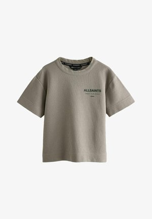 Beiges T-Shirt aus Waffelstrick mit kurzen Ärmeln und Rundhalsausschnitt, mit dem "ALLSAINTS"-Logo auf der linken Brust, flach auf weißem Hintergrund liegend.