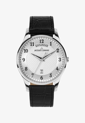 Orologio rotondo in argento con cinturino in pelle nera, che mostra le 10:10:37, la data "7" e il giorno "sabato" su un quadrante bianco texturizzato.