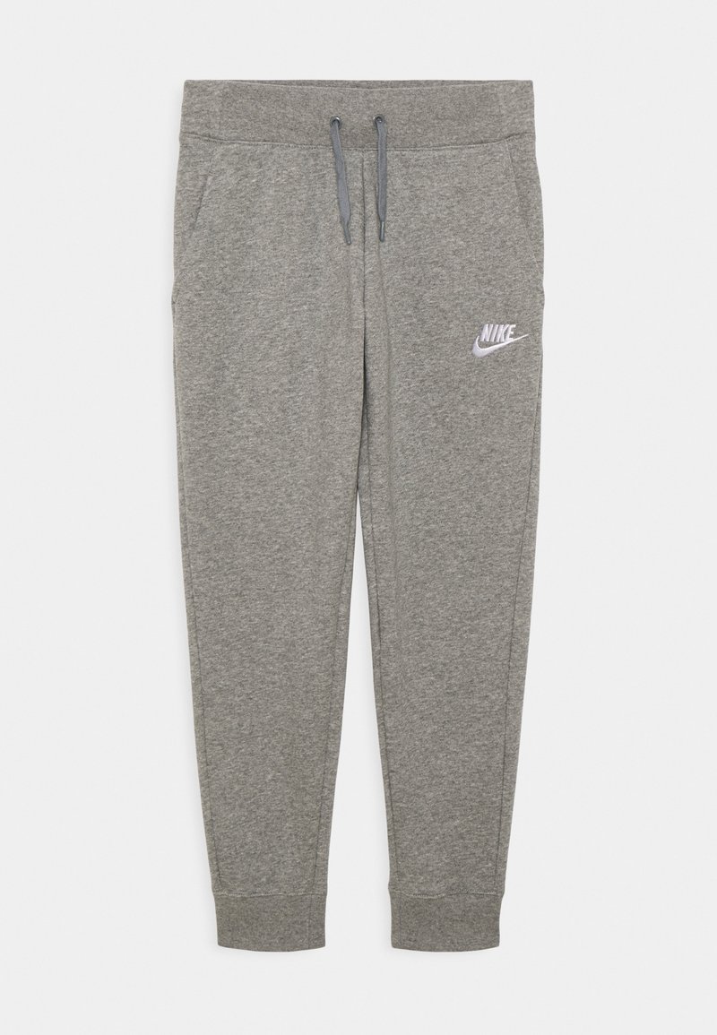 Gray sweatpants with an elastic waistband, drawstring, side pockets, and a white Nike logo on the left thigh. Soft material and tapered fit.