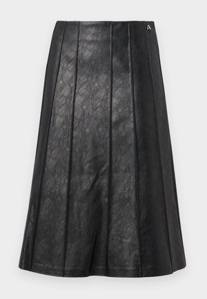 Black pleated skirt made of textured leather, featuring a hidden side zipper and a logo accent on the waistband.