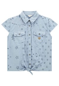 Light blue short-sleeve shirt with eyelet floral patterns, button closure, two front pockets, and a tied hem detail. Features a small heart metal accent.