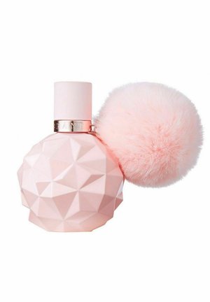 Pink faceted perfume bottle with a round cap and a large soft pink fluffy pom-pom attached to the side.