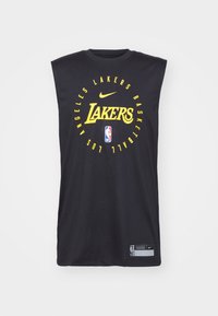 Camisola sem mangas da Nike na cor preta com texto amarelo "Lakers", gráficos de basquetebol e um rótulo com a marca da NBA na barra. Tecido suave.