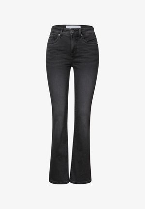 Jean noir évasé en denim, avec une taille haute, cinq poches et des coutures visibles le long des seams. Fini texturé.