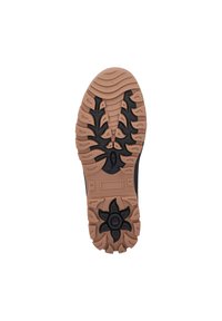 Semelle de chaussure en caoutchouc noir et roux présentant un motif de relief texturé avec des rainures et des formes florales. Taille 38 indiquée sur le côté.