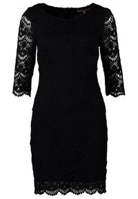 Robe en dentelle noire avec des manches trois-quarts, silhouette ajustée, motif floral, ourlet festonné et détails transparents sur les manches.