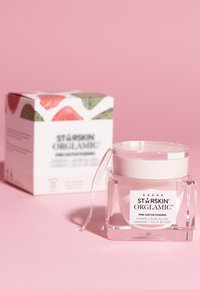 Clear glass jar with white lid, labeled "STARSkin Organic Pink Cactus Pudding." Comes in a colorful box featuring pink and green accents.