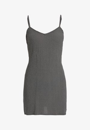 Robe à carreaux noir et blanc avec de fines bretelles ajustables, coupe moulante et texture lisse. Présente un décolleté en forme de scoop et un ourlet droit.