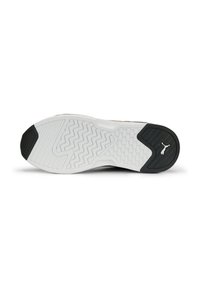 Semelle de basket blanche et noire avec semelle à motif et logo Puma sur la partie talon noire, présentée sur fond blanc.