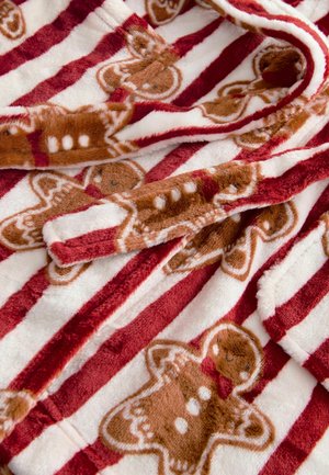 Rot-weißer gestreifter Decke mit Lebkuchenmann-Muster, weiche Plüschtextur, mit braunen und weißen Details.