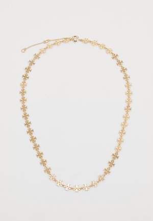 Gold necklace featuring interlocking puzzle piece designs, smooth surface, delicate chain, and lobster clasp with adjustable length.