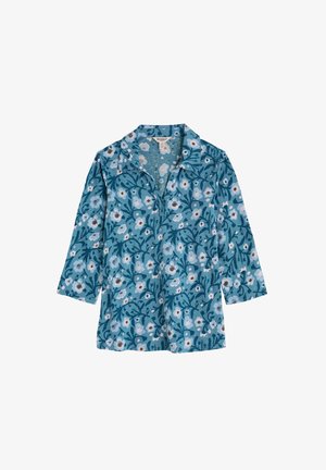 Camicia floreale turchese con scollatura a collo, maniche a tre quarti e una texture morbida con un motivo floreale ripetuto e accenti verdi.
