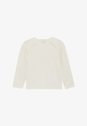 Krem top s dolgimi rokavi z diskretnimi navpičnimi črtami, ima okroglo izrez in naborke na ramenih. Mehak, teksturiran material.