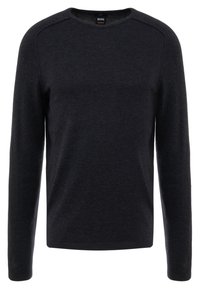 Maglione nero con maniche lunghe, scollo rotondo e tessuto morbido e strutturato. Presenta un logo discreto sul colletto. Leggero e traspirante.