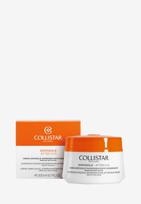 Collistar Doposole After Sun creme i en hvid krukke med et orange låg, ledsaget af en orange æske med tekst og logo i sort.