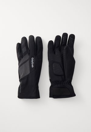 Luvas pretas à prova d'água com um painel de aderência texturizado, detalhes pontilhados e um forro interior de fleecy suave. Bem ajustadas, com fechos ajustáveis no punho.