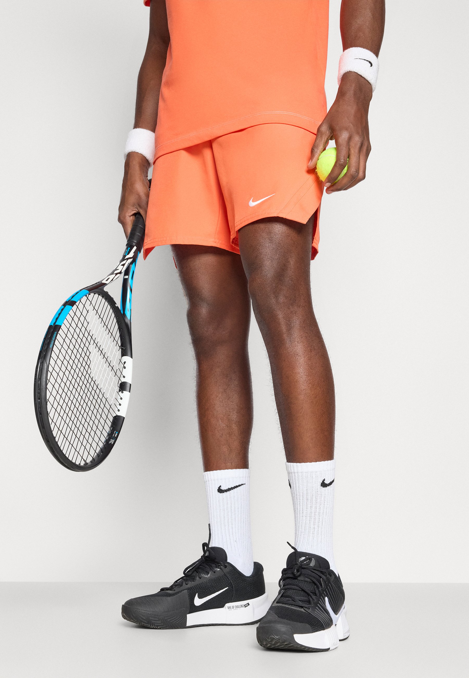 nike turf orange shorts