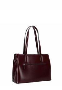 Bordeauxrode leren totebag met twee lange hengsels, een hoofdvak met ritssluiting en een voorvak met rits. Soepele textuur, gestructureerde vorm.