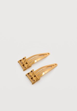 Two gold-toned metal hair clips with interlocking chain-link design on a plain white background.