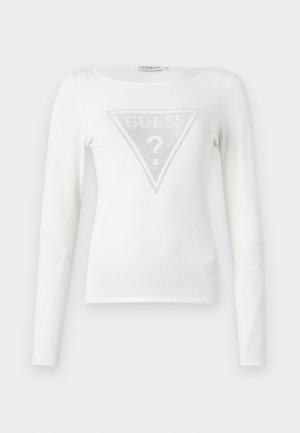 Witte lange mouwen shirt van zachte stof, met een driehoekig zilveren "GUESS" logo met een vraagteken in het midden.