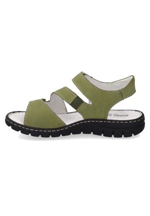 Green suede sandal with adjustable straps, open design, cushioned footbed, and black rubber sole featuring textured tread for grip.