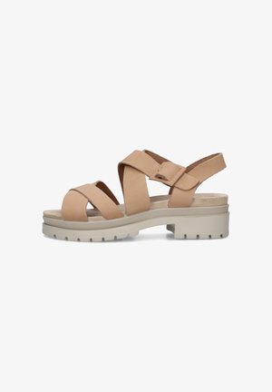 Sandalo in pelle beige con spesse fasce incrociate, plantare imbottito, fibbia regolabile e suola robusta scanalata con tacco basso.