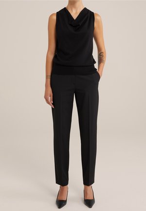 Stickad tröja - black