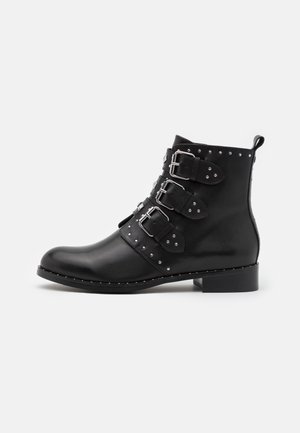 Botines camperos - black