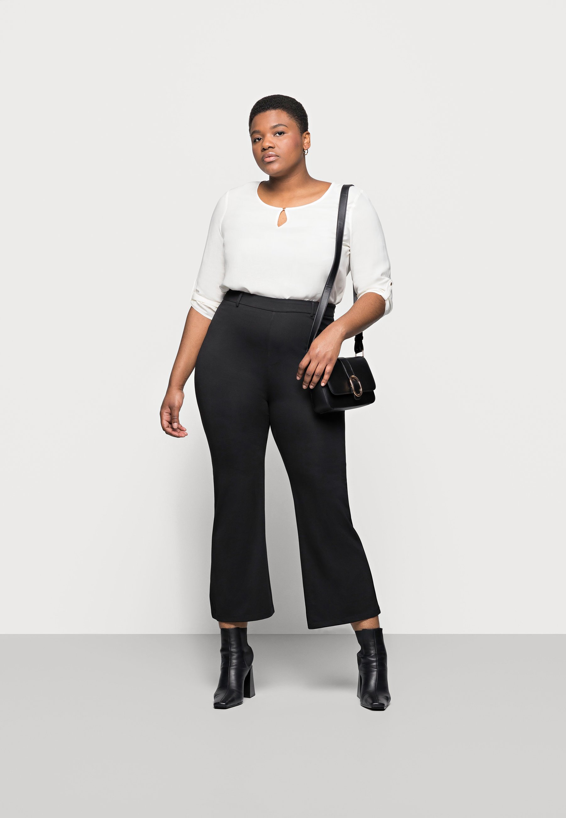 Femme Flared PUNTO trousers - Pantalon classique Femme Flared PUNTO trousers - Pantalon classique