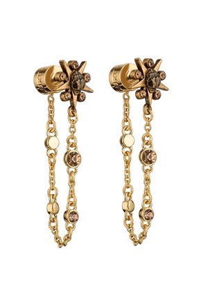 Gold-tone earrings with star-shaped accents, beaded chains, and bronze crystals. Features a textured finish and intricate detailing.