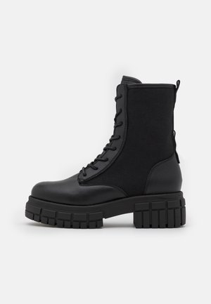 Platform ankle boots - black