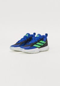 Blue and black athletic shoes with green accents. Features include a textured upper, round toe, and a white sole with a patterned tread.