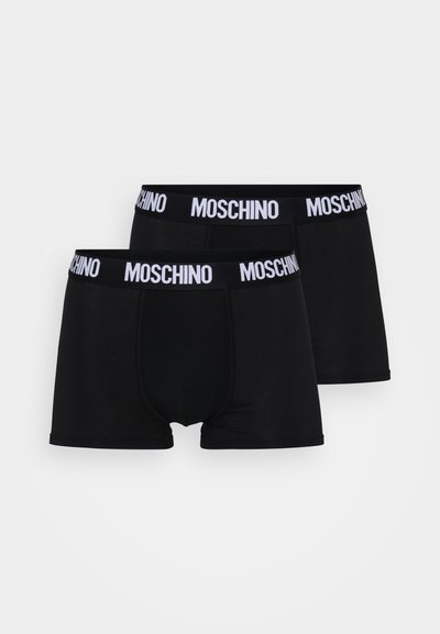 Black boxer shorts with a white MOSCHINO logo on the elastic waistband. Made of soft, smooth fabric, featuring a fitted design and short legs.
