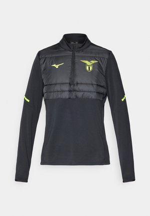 Black long-sleeve top with a quarter zip, featuring a padded chest section, neon accents, and a logo on the left side. Smooth texture.