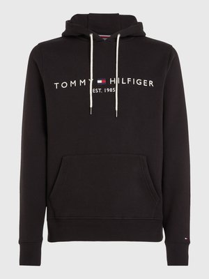 Black hoodie with white drawstrings, front pocket, and "Tommy Hilfiger EST. 1985" text with brand logo across the chest.