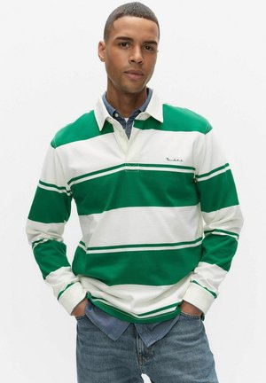 Grön- och vitrandig långärmad pikétröja i bomull, med krage och logotyp på bröstet.