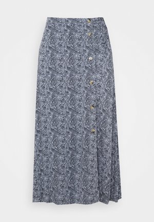 Jupe midi bleue avec un motif moucheté noir et blanc, boutonnée d'un côté avec six boutons argentés.