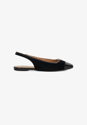 Black slingback shoe featuring a suede upper, patent leather capped toe, and a small metallic accent. Flat sole with a smooth finish.